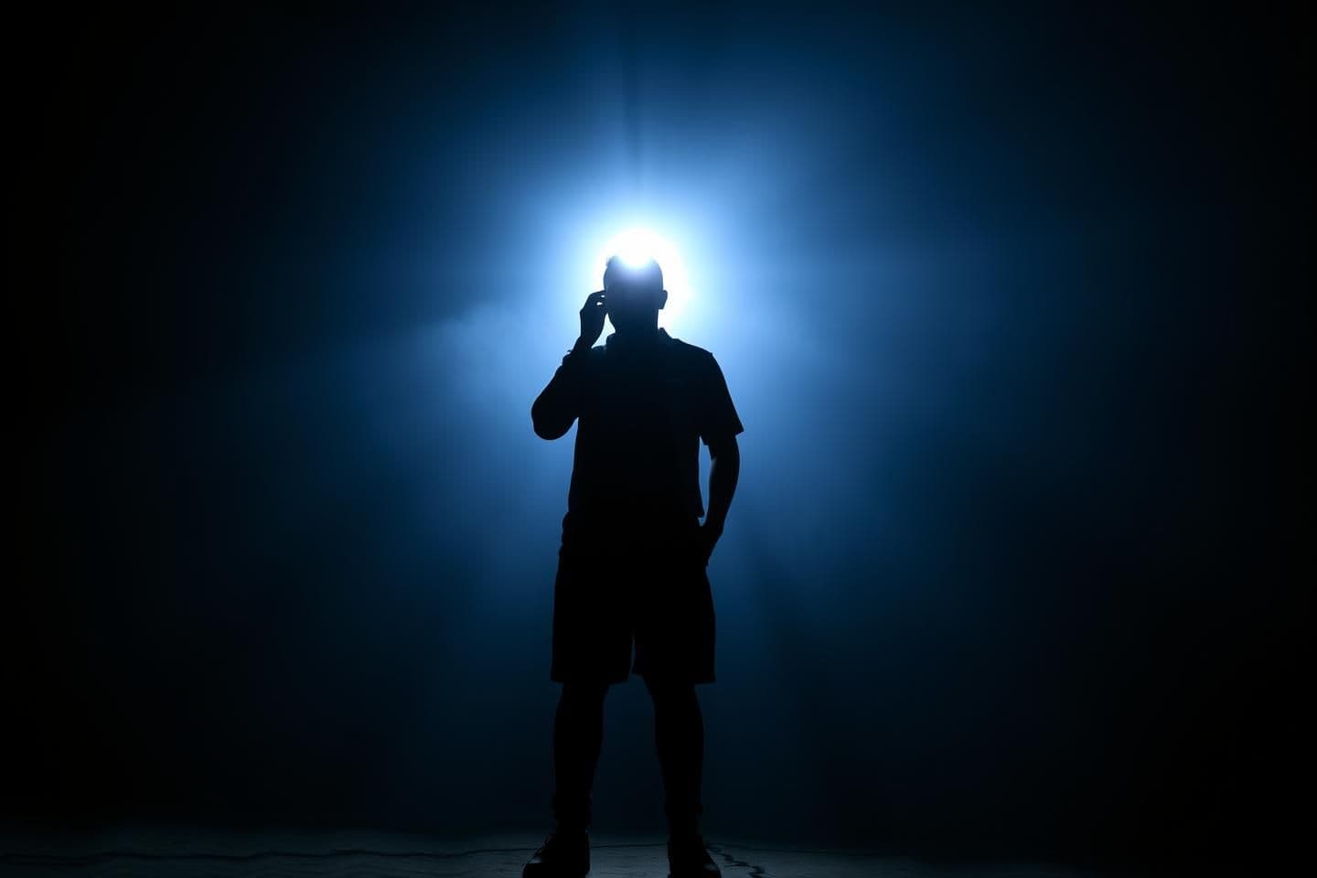 AI generated: There is a rap thumbnail where a person will stand in the dark with just a light on their head and the thumbnail will be written "50M" and below will be written "views like" and on