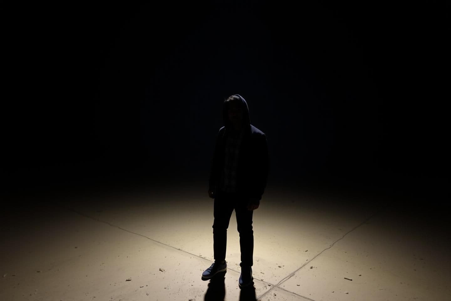 AI generated: There is a rap thumbnail where a person will stand in the dark with just a light on their head and the thumbnail will be written "50M" and below will be written "views like" and on